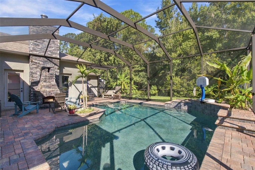 Photo of 26221 Sword Dancer Drive, Wesley Chapel, FL 33544 (MLS # TB8550946)