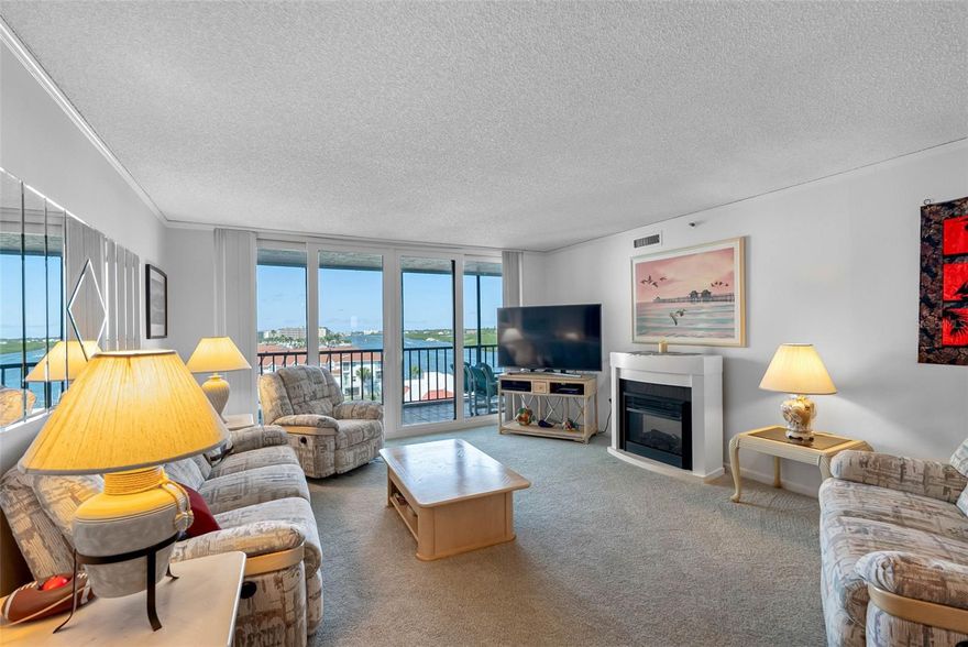 Large (13x45) deeded slip #11 with Boat lift - Plus Penthouse floor residence #611.  A  2-bedroom, 2-bath, 1,360-square-foot Condominium - Turnkey - Furnished & Equipped. The deeded Boat Slip has a 13-foot beam and can easily handle a good 45' foot or larger craft. Updated Kitchen. New Balcony Impact Sliders - New Impact Windows & New Storm Shutters. New AC System - New Water Heater  - New Front Door w/ New Door Frame, New Screen Door and New Carpet 2024...Welcome to Vista Bay Condominiums. Located on the Intracoastal Waterway in Indian Shores, Florida. Enjoy the best of both worlds. All the Water & Boating activity of the Intracoastal with Beach access just across the street. An updated condominium that has been well-kept and never rented. A top-floor location, Residence 611 offers long-range water views from the living room, 30' Balcony, Master Bedroom & Kitchen. The front walkway also enjoys Intracoastal water views as well as partial Gulf views and has a front-row seat to Tennis & Pickleball matches. The condominium conveys with under-building parking #80 plus tandem parking spot #81 right behind it, plus 6th-floor storage space. The unit is also equipped with new storm shutters for easy lockdown. Vista Bay is a well-managed complex that offers a heated pool, shuffleboard, car wash, grilling station, community fishing & sitting docks, deeded boat slips, day dock and tennis/pickleball courts - plus an abundance of guest parking (40 plus guest spots ), perfect for entertaining or dinner guests. Beach access right across the street. Complex financials are in good shape. Indian Shores aka The Narrows is known for it's semi-private beaches due to coastal configuration & lack of public parking. Walk to restaurants & nightlife. Small friendly town just 5 miles south of Clearwater Beach and 22 miles due west from the Tampa airport.  Walk to Restaurants & Nightlife..  Three miles mol to the New Seminole City Shopping Center - an Upscale Mall destination offering Shopping, Cafes ,Restaurants, New Movie theater, Health Store and Gym. Lastly, 20 Minutes to the Dali Museum, Sporting Events and Downtown St Pete. Tired of crowds? Come to Vista Bay and enjoy the Boating life. Easy show, walk-through & virtual tour available. Call for immediate private showings. Vista Bay is a Secured Private Complex with a 3 month minimum rental period.