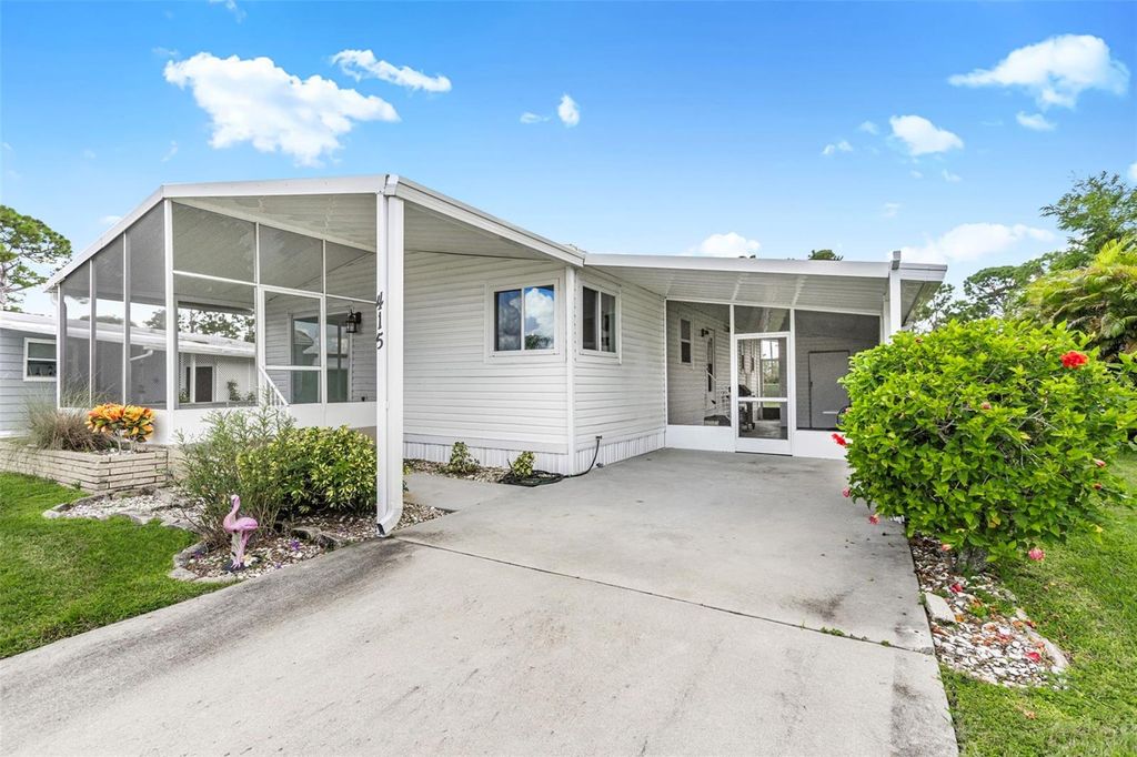 Photo of 415 Villa Nueva Circle, North Port, FL 34287 (MLS # TB8421713)