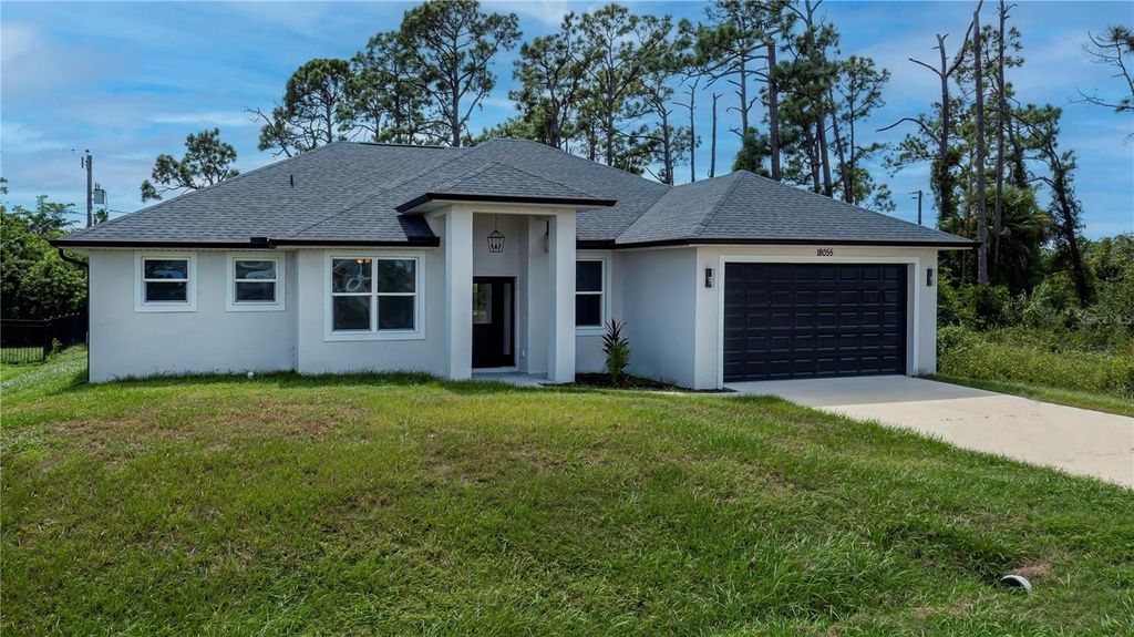 Photo of 18055 Dublin Avenue, Port Charlotte, FL 33948 (MLS # C7515811)