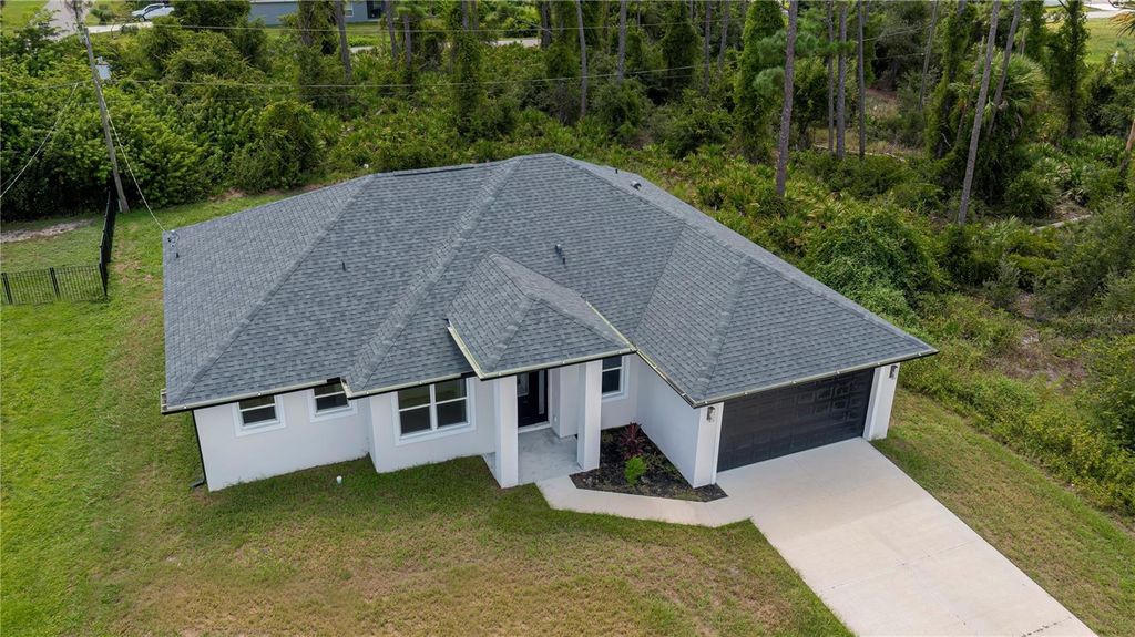 Photo of 18055 Dublin Avenue, Port Charlotte, FL 33948 (MLS # C7515811)