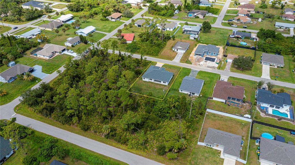 Photo of 18055 Dublin Avenue, Port Charlotte, FL 33948 (MLS # C7515811)