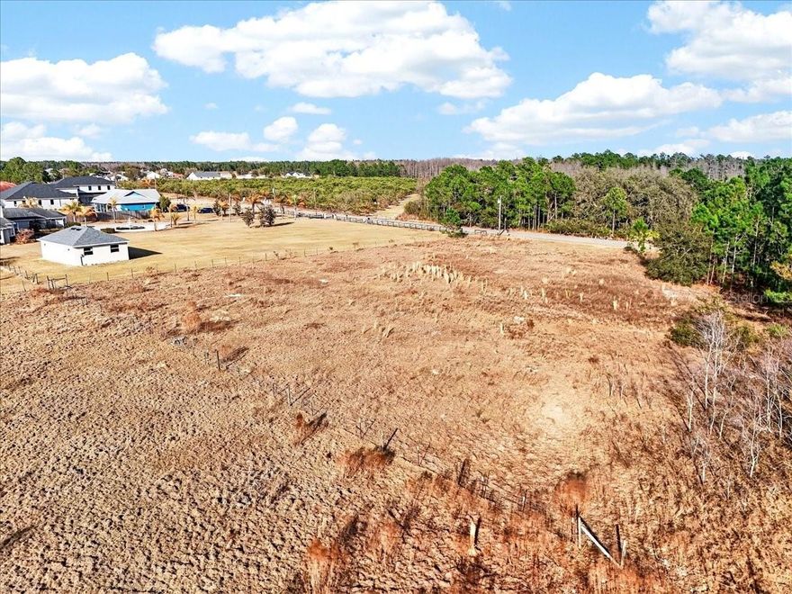 TWO PARCELS 1.76 ACRES. POLK CITY. Side-by-side vacant parcels being sold together with paved frontage along Sweet Hill Road in growing Polk County. This property presents a strong opportunity for INVESTORS, BUILDERS or BUYERS that are seeking LAND, SPACE, and FLEXIBILITY, this opportunity deserves your attention. Peaceful rural surroundings with convenient access to I-4 for Lakeland, Orlando, and Tampa. Close to outdoor recreation including the Van Fleet Trail and nearby lakes. For additional information or to discuss this opportunity in more detail, please contact us today.