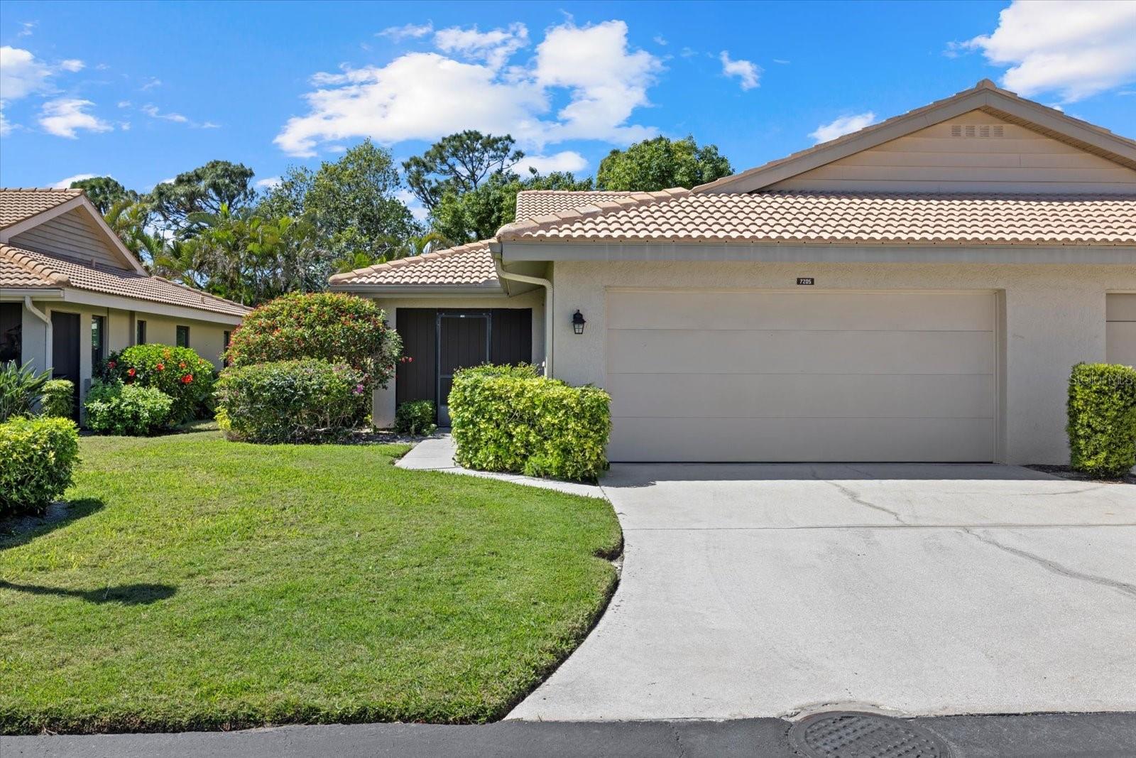 Welcome to this inviting Gulf Gate villa within walking distance of the quaint Gulf Gate Village and all of its fun shops and restaurants. Woodside Terrace is only a stones throw from the number one beach in the country, beautiful Siesta Key Beach. If you'd like to stay at home and enjoy this small and peaceful community, relax by the lovely heated pool next to the clubhouse, where on occasion there are fun activities for the residents. The spacious and open villa has been updated with luxury vinyl flooring, fresh paint, and impact windows. A glassed-in the lanai can be opened up to enjoy the great outdoors or closed when the weather is not so welcoming. A two car garage with attic space provides great storage. This is a great opportunity at this price point.