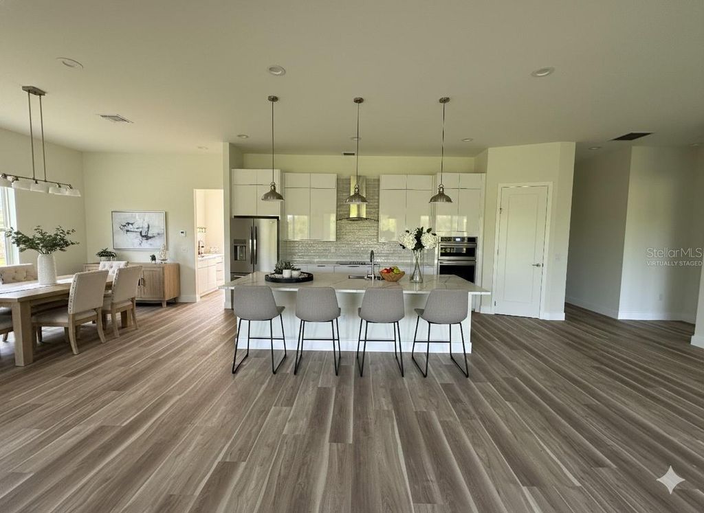 Photo of 15561 Aldama Circle, Port Charlotte, FL 33981 (MLS # O6364587)