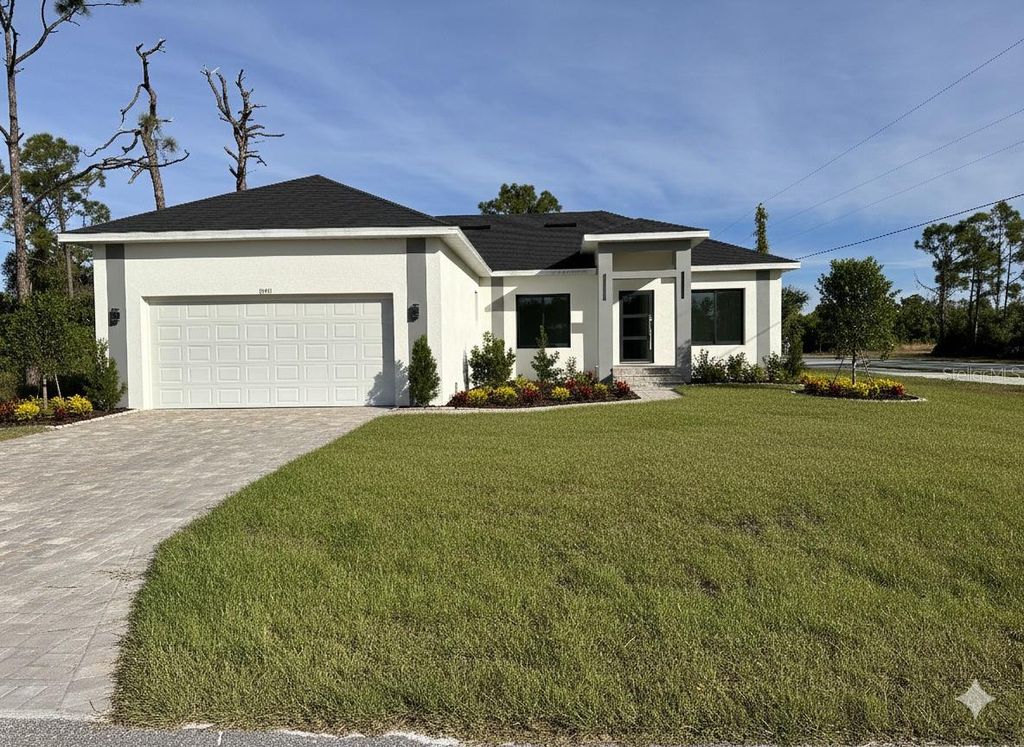 Photo of 15561 Aldama Circle, Port Charlotte, FL 33981 (MLS # O6364587)