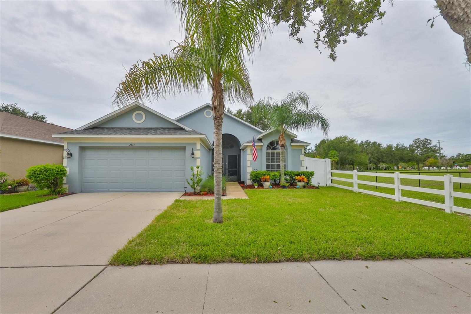 DISCOVER YOUR OWN PIECE OF PARIDISE READY TO MOVE RIGHT IN! Take the virtual tour of this charming 3-bedroom, 2-bath home feels more spacious than its square footage suggests. It offers the unique advantage of living in a planned community while enjoying the privacy akin to country life, with no neighbors on one side or behind you. Perfect for pet owners or families, the generous fenced backyard is ideal for your furry friends, a playground or if you wish to put in your own private pool. Recent upgrades include a brand-new roof, stylish new LPV flooring throughout, a roomy screened lanai, and a welcoming screened front porch adorned with brick pavers. River Bend boasts a brand-new activity center featuring a pool, playground, tennis and pickleball court, and a fitness center, all included with the annual CDD fee of $2,236.41. The HOA fee is just $99 every six months. Don't miss your chance to see this home it won't last long! Conveniently located between Tampa, Sarasota, and St. Petersburg, you'll be close to international airports, sporting events, hospitals, including the new Moffitt Cancer Center, shopping, and dining options.