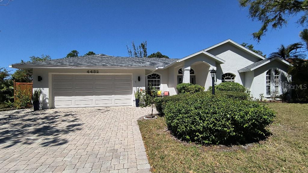 Greenfield Lakeview Retreat with Pool!
Welcome to this rare find in the coveted Greenfield neighborhood—a single-family home with
stunning lake views to the south and west. Ideally located in the heart of Sarasota and within
one of the area’s top-rated school districts, this 3-bedroom, 2.5-bath home with a den/office is
designed for easy Florida living, complete with a sparkling pool, semi-open floor plan, vaulted
ceilings, and plenty of natural light.
Double entry doors open to a welcoming foyer, with a formal dining room on one side and a
spacious living room straight ahead—both overlooking the pool. The breakfast nook and large
family room flow effortlessly onto the pool deck, creating the perfect space for entertaining or
everyday relaxation. The kitchen stands out with granite countertops, a snack bar, pantry, and
brand-new stainless steel appliances.
The primary suite is a true retreat with sliding glass doors to the pool and an ensuite bath
offering double sinks and a walk-in shower. Both full bathrooms have been beautifully
remodeled with modern finishes. A separate laundry room connects directly to the two-car
garage.
Just a short distance to The Legacy Trail and one block from Ufer Park, you’ll enjoy an active lifestyle
close to nature—while still being minutes from schools, shopping, dining, and Sarasota’s award-
winning beaches.
