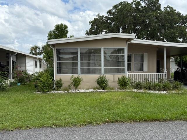 Welcome to your future home with NO LOT RENT! Located in the NO pet part of Molokai with exceptions for support animals with papers. This 2 bedroom, 2 bath home includes washer and dryer located in the storage shed with lots of additional storage space. Located in MOlokai Co-op, a highly sought after and affordable 55+ community in Leesburg. Molokai offers a heated pool, a recreation center with activities and the monthly HOA fee includes cable, internet, water, trash and sewer as well as the community amenities. This home is close to shopping, restaurants and major highways. Also you are not far from Downtown Mount Dora, Downtown Tavares and Downtown Leesburg.The home is only a short distance to a public boating ramp for the Harris Chain of Lakes. Do not nmiss your chance to call this HOme. This home combines comfort, convenience and a welcoming community - offering everything you need to enjoy your best years. Seller is motivated so schedule your Private Showing today!