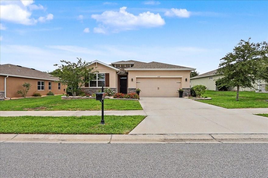 Welcome to JB Ranch living! This beautifully maintained 2,039 living square foot, 4-bedroom, 2-bath home at 6265 SW 88 Loop, Ocala, offers comfort, style, and modern convenience all in one. Step inside and immediately notice the soaring high ceilings and elegant ceramic tile flooring that create an open, bright, and spacious feel throughout. With a desirable south-facing orientation, this home enjoys excellent natural light all day long.
The thoughtfully updated features new ceiling fans, smart Wi-Fi-enabled features, a convenient inside laundry room, and included washer, dryer, and refrigerator. The kitchen shines with beautiful under-cabinet lighting, adding both ambiance and functionality, while upgraded outdoor lighting enhances curb appeal and evening enjoyment.

Step outside and enjoy the newly installed backyard fence, creating a private outdoor retreat perfect for pets, entertaining, or simply relaxing.

Move-in ready and loaded with upgrades, this home offers the perfect blend of space, comfort, and modern living in desirable JB Ranch. Schedule your private showing today!