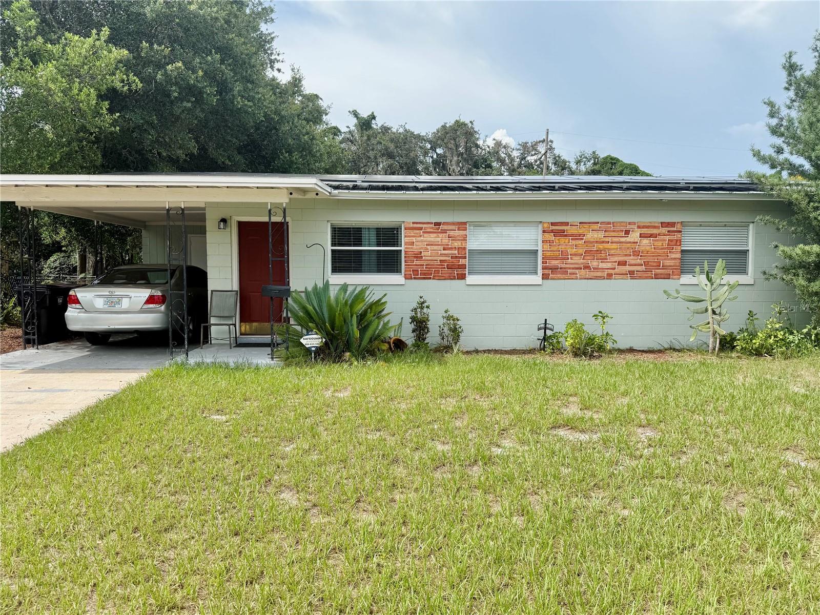 Nicely and well maintained mid-century single family home for rent which is centrally close to DOWNTOWN ORLANDO, Azalea Park, Englewood Park. This is a 3 bedroom and 1 bath fenced-in home with new A/C, water heater, new vinyl floors in the bedrooms and tile for the rest of the home. It's been freshly painted on the inside with new ceiling fans in the bedrooms. The home comes with solar panels that will save you on the electric bill, security systems that can be used and brand new washer and dryer. Lawn care is included in the rent as well. Schedule your private tour today!