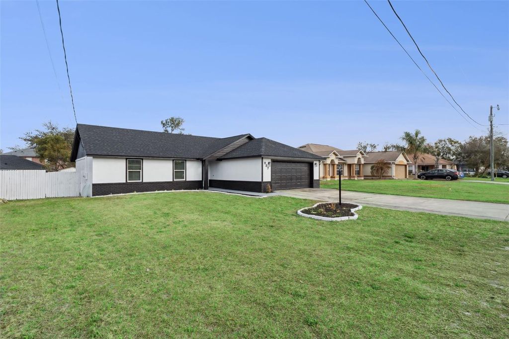 Photo of 937 Potomac Avenue, Deltona, FL 32738 (MLS # O6384325)