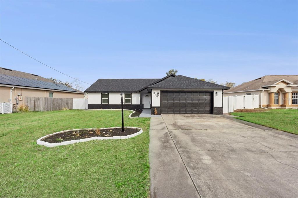 Photo of 937 Potomac Avenue, Deltona, FL 32738 (MLS # O6384325)