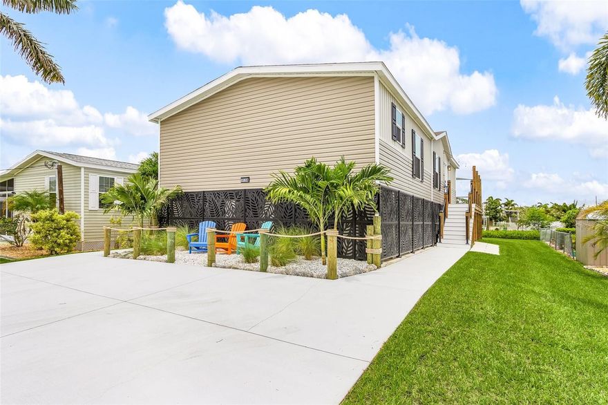 Do you have your toothbrush ready? That’s all you’ll need for 3118 Bayberry Ave, Punta Gorda, FL -  this brand-new Gulf access home in beautiful Punta Gorda, Florida! Located in the sought-after (Non-HOA) Charlotte Park boating community, this home offers the perfect blend of strength, style, and serenity for those dreaming of true Florida waterfront living. You will love the ease of boating from your private dock complete with a remote-controlled lift and solar lighting. Every detail of this home has been thoughtfully engineered for quality and peace of mind, from the triple-reinforced concrete piers that exceed building standards to the elevated design providing safety, strength, and favorable insurance benefits. Step inside to an open, light-filled floor plan that welcomes you with coastal comfort and modern luxury. The Wi-Fi thermostat, Ring doorbell system, and app-controlled color-changing lighting let you control your environment from anywhere, while marine-grade, saltwater-rated lumber ensures lasting durability. Every appliance, piece of furniture, and decorative detail is brand new, creating a truly turnkey opportunity to simply move in and start living the Florida dream. Wake up to gentle breezes and start your day with coffee on your custom deck overlooking the canal. Crafted with Owens Corning Barefoot decking that stays cool underfoot and shaded by custom sail sails, it’s the perfect place to relax, entertain, or enjoy a quiet moment as the sun rises over the water. Whether you spend your mornings fishing off the dock, afternoons boating to open waters, or evenings unwinding under string lights, this home offers a lifestyle defined by ease, beauty, and peace of mind. Located just minutes from everything that makes Punta Gorda so special, you’re only 5 minutes to Fishermen’s Village and the restaurants, boutiques, and waterfront views of historic downtown Punta Gorda. Enjoy live music, local seafood, and waterfront dining at The Perfect Caper, Harpoon Harry’s, TT’s Tiki Bar, or Carmelo’s Italian, all within a short drive. Sunseeker Resort is just 10 minutes away, offering world-class dining, entertainment, and resort amenities. Travel is a breeze with Punta Gorda Airport (PGD) only 15 minutes away, I-75 access in under 10 minutes, and Southwest Florida International Airport (RSW) less than 45 minutes from your driveway. Whether you’re heading out for dinner, a flight, or a day on the water, convenience and connection meet in the heart of this Florida coastal home. With superior construction, elevated systems, and a perfect location near downtown Punta Gorda’s marinas and waterfront parks, this new home is more than just move-in ready—it’s ready for you to live the life you’ve been dreaming of.
