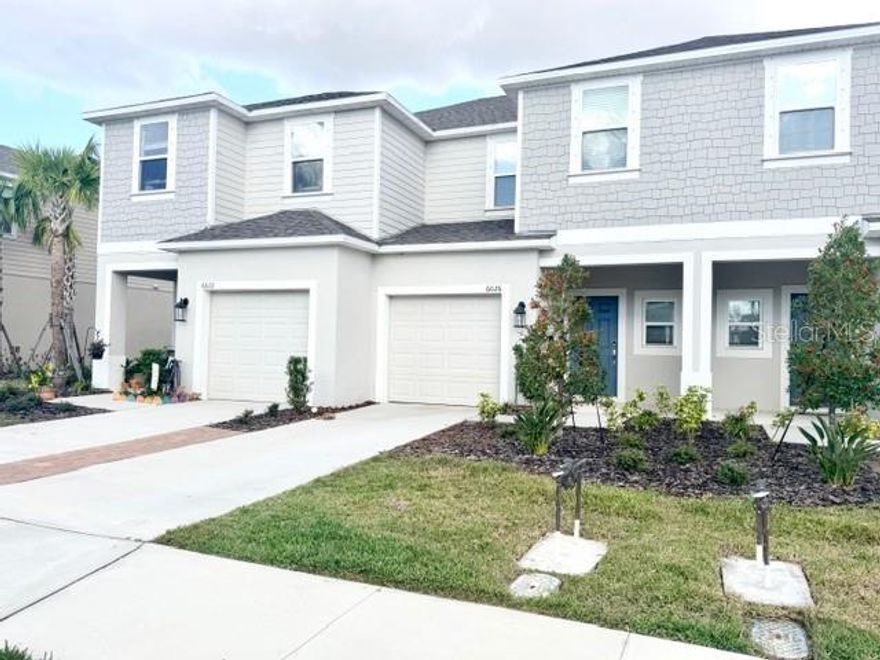 AVAILABLE TO MOVE IN NOW! ONLY 2,100 New Jasmine townhome in Edgestone at Artisan Lakes, offering 1,373 sq. ft. of thoughtfully designed living space with 3 bedrooms, 2.5 bathrooms, and a 1-car garage. This home features a spacious gathering room and an open-concept kitchen filled with natural light. Upstairs includes two secondary bedrooms, a full bathroom, and a large owner’s suite with ample storage, including an oversized walk-in closet and a double-sink vanity. Interior features include Fanfare 36” cabinets, Quartz countertops in the kitchen and full-size bathrooms, Mohawk Sinova 18x18 tile flooring throughout, GE stainless steel energy-efficient appliances, and faux wood blinds on all windows.  Enjoy access to a the community pool, BBQ, cabana area and playground, perfect for living the Florida lifestyle. Located in the great Edgestone at Artisan Lakes Community in Palmetto. Close to I-75 within 20 minutes to St. Petersburg, 20 min to Lakewood Ranch, and close the top-rated beaches in the country.