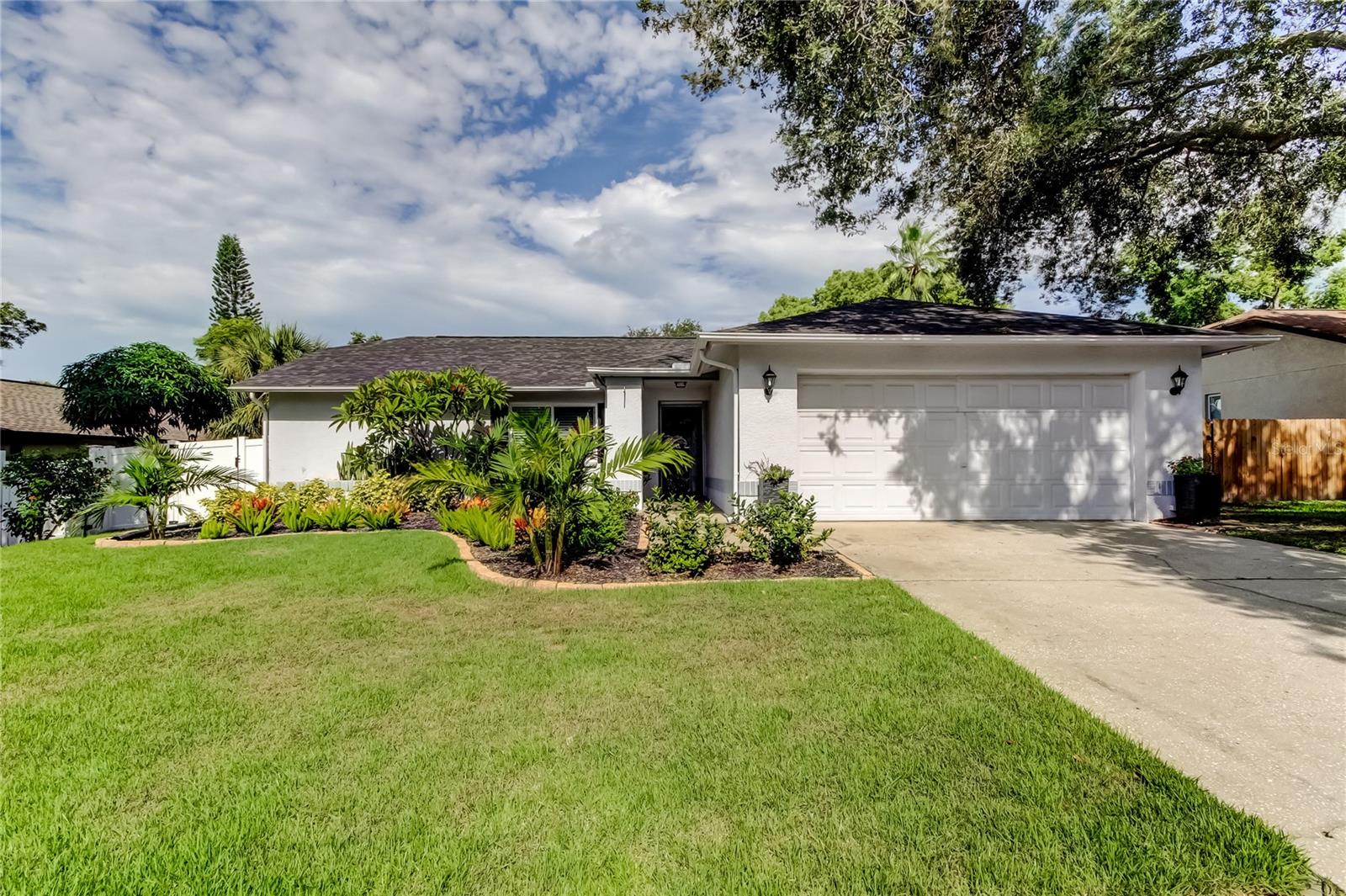 Light, Bright and Beautiful POOL HOME in Great Location! Tucked Away Down Peaceful Street, Just Minutes From Popular Honeymoon Island BEACH! Rent a Paddleboard, Go Kayaking or Store Your Boat at the Local Marina! NOT IN A FLOOD ZONE! Desirable Great Room Floor Plan Features Cathedral Ceilings! FRESHLY PAINTED INTERIOR! Ceiling Fans Throughout! NEW BASEBOARDS! Classic Kitchen Features Wood Cabinetry, Granite Countertops, Tiled Backsplash! Breakfast Bar Great for Entertaining Family and Friends! Kitchen is Open to the Family Room! Tile Flooring in All the Right Places! Split Bedroom Plan! Inside Laundry Room Includes NEWER WASHER AND DRYER! Utility Sink and additional Storage Cabinets! ESCAPE TO PARADISE IN YOUR OWN BACKYARD!!! Birdcaged, Upgraded SALTWATER POOL! Covered Lanai for Hosting Parties and Barbequing! NEW PVC VINYL FENCED BACKYARD Provides Privacy and Safety for Your Child to Play or Pet to Romp! NEWLY INSTALLED SOD and Professionally Landscaped Flower Beds! Wonderful Curb Appeal! Upgrades Include: NEW DIMENSIONAL SHINGLE ROOF, NEW A/C SYSTEM, NEW HURRICANE IMPACT WINDOWS, NEW BACKYARD FENCE. NEW SCREENS ON BIRDCAGE! Attic Access! Rainbird Irrigation System! Front and Back GUTTERS! NO HOA FEES! Nearby Top Rated Schools.. Just a Few Blocks Away! Nearby Pinellas County Trail for Biking or Walking! Shopping! Restaurants! Hospital! Easy Access to Tampa International Airport! Schedule Your
Appointment TODAY! Must SEE inside to Appreciate! Shows Pride of Ownership! PERFECT For a Retiree, 1st Time Home Buyer or as a
Vacation Home!