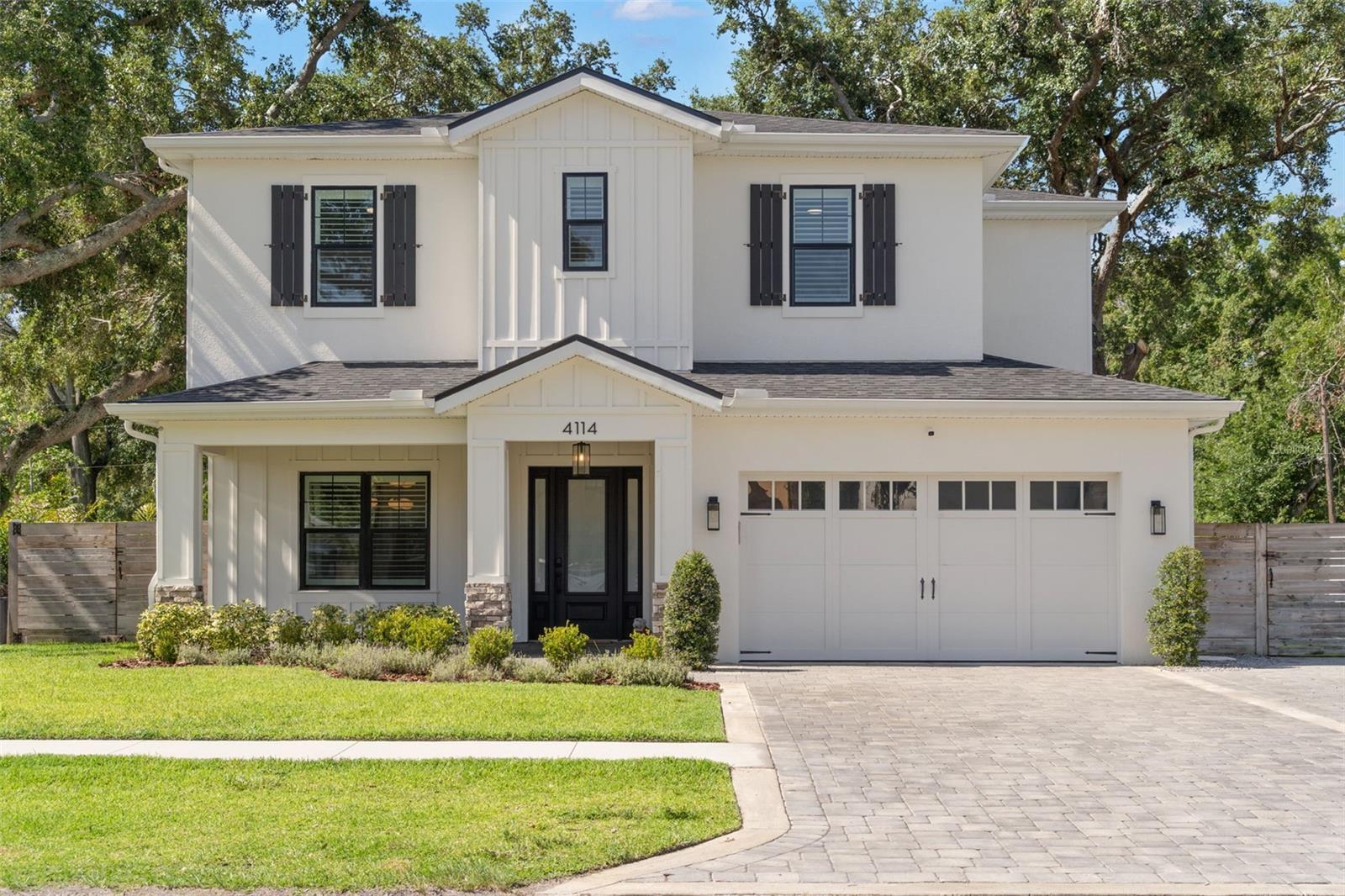 Welcome to this stunning newer-construction custom home in the heart of Culbreath Heights, one of South Tampa’s most sought-after neighborhoods. Designed with exceptional detail and quality craftsmanship, this move-in ready residence features elegant finishes, smart home technology, and outstanding livability.
Inside, you’ll find 10-foot ceilings, wide-plank engineered hardwood floors, and striking floor-to-ceiling shiplap. The open-concept kitchen was designed with intention and boasts soft-close cabinetry, quartz countertops, premium appliances, and a butler’s pantry with wine fridge. A built-in mudroom offers convenient storage.
Upstairs, the spacious primary suite includes a freestanding soaking tub, large walk-in shower, double vanities, and a custom walk-in closet. Three additional bedrooms offer comfortable living with access to beautifully tiled bathrooms.
Step outside to a private backyard oasis featuring a newly completed pool, outdoor kitchen, and fenced yard—perfect for year-round entertaining. A pavered driveway and professional landscaping enhance the home’s curb appeal.
Modern upgrades include impact-rated oversized windows and the Brilliant Smart Home System with touchscreens in the living room and primary suite.
Located in the top-rated Plant High School district and close to Dale Mabry Elementary, Coleman Middle, parks, tennis courts, and all of South Tampa’s best attractions. Just minutes to Downtown Tampa, Tampa International Airport, Armature Works, and the Riverwalk.
