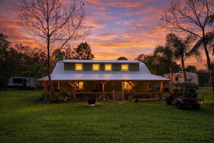 This exceptional 5+ acre property is ideally located just off SR-415, offering excellent accessibility and strong potential for agricultural, residential, or business use. The expansive acreage provides ample space for operations, storage, or future development.
The beautiful ranch-style home features a downstairs primary suite with a spacious walk-in closet, two stone fireplaces, elegant laminate flooring, and a bright open-concept living and kitchen area, perfect for entertaining. The second floor overlooks the dining area, adding architectural character and openness. Enjoy both a front porch and a back porch with peaceful pond views, plus a dedicated downstairs office and an oversized laundry room as an added bonus.

The property includes two separate barns:

A large 2,292 sq ft barn with insulated flooring, a concrete slab, and a walk-in cooler

A second 950 sq ft barn, ideal for storage or workspace

Both barns are well-suited for heavy equipment, large items, or home-based business operations. An RV pad with its own septic system adds further versatility.

This is an incredible opportunity to own a versatile property with the potential to be transformed into a highly desirable barn-style event venue, one of today’s fastest-growing trends. Its strategic location makes it attractive to guests from Orlando, Jacksonville, Daytona, and New Smyrna, positioning it for strong demand and income potential.