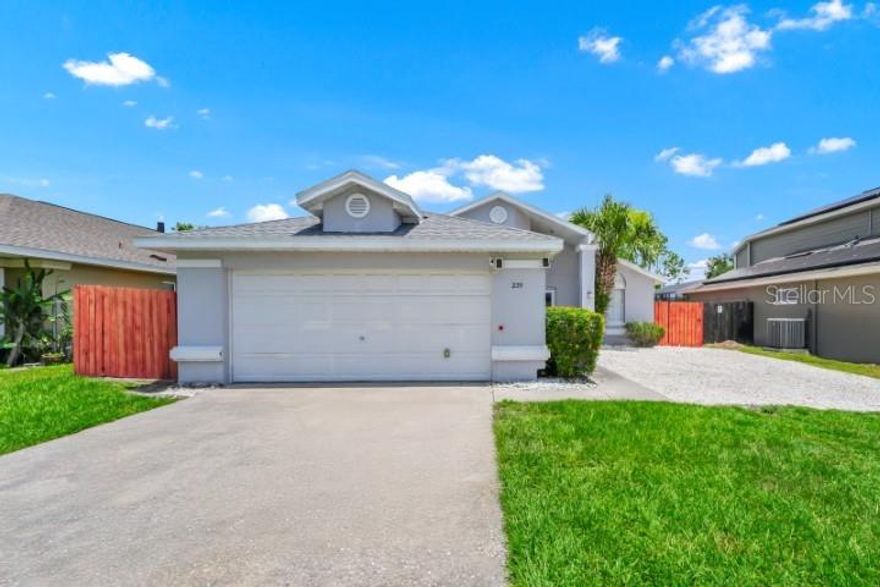 NO HOA + POOL HOME + VERSATILE BONUS SPACE in Kissimmee! Freshly painted inside and out, this fully-fenced 2-bedroom, 2-bath home features brand-new vinyl plank flooring, refinished kitchen cabinets with new stainless steel appliances, and a brand-new roof (2024). Step outside to a screened in-ground pool with newer finish, professionally landscaped with white river rock surrounding the entire property — low maintenance, high curb appeal. A converted bonus space offers a kitchenette, full bathroom, and separate entrance with its own A/C — perfect as a guest suite, home office, in-law area, or flexible use space. No HOA = total freedom on parking, pets, and use. Minutes to Osceola Parkway, Florida's Turnpike, Lake Nona, Orlando International Airport, and 25 minutes to Disney. Roof under 2 years = lower insurance, clean 4-point. Vacant and easy to show. Highly motivated seller!