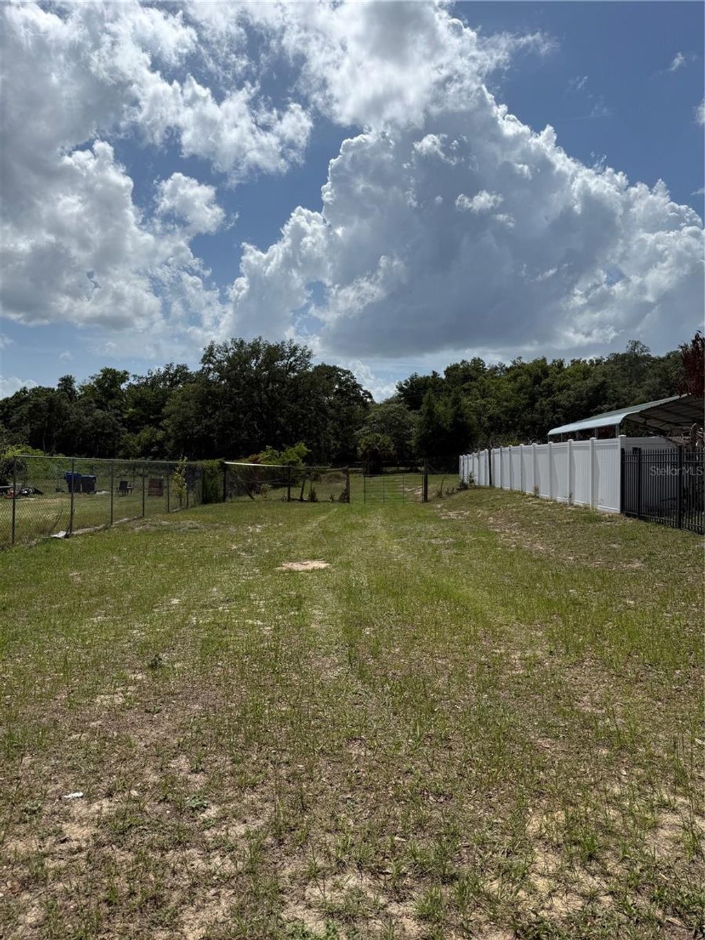 Photo of Enka Way, Orlando, FL 32818 (MLS # O6412820)