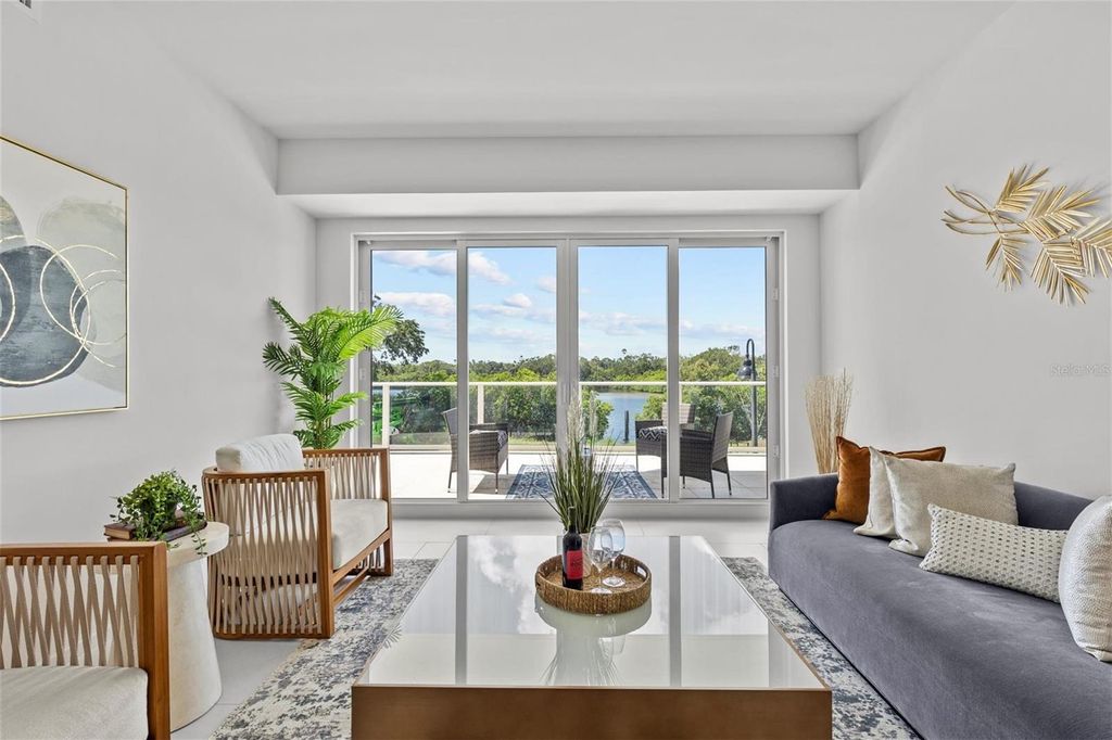 Photo of 1020 Sunset Point Road #112, Clearwater, FL 33755 (MLS # TB8408479)