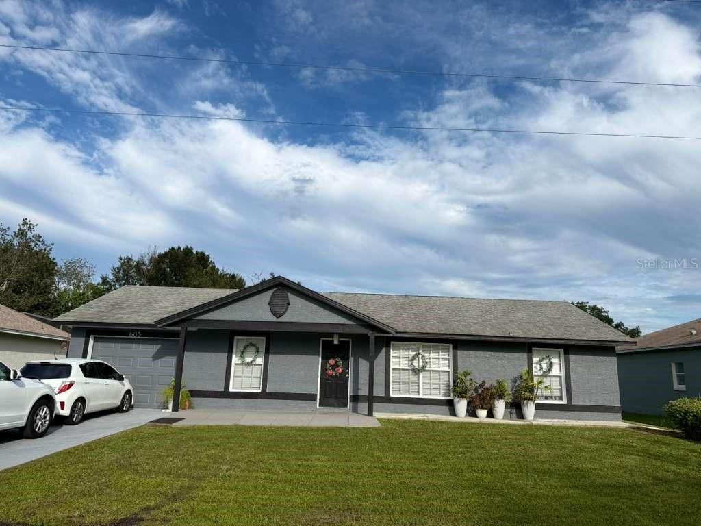 Photo of 605 Tamarin Lane, Kissimmee, FL 34759 (MLS # TB8429363)