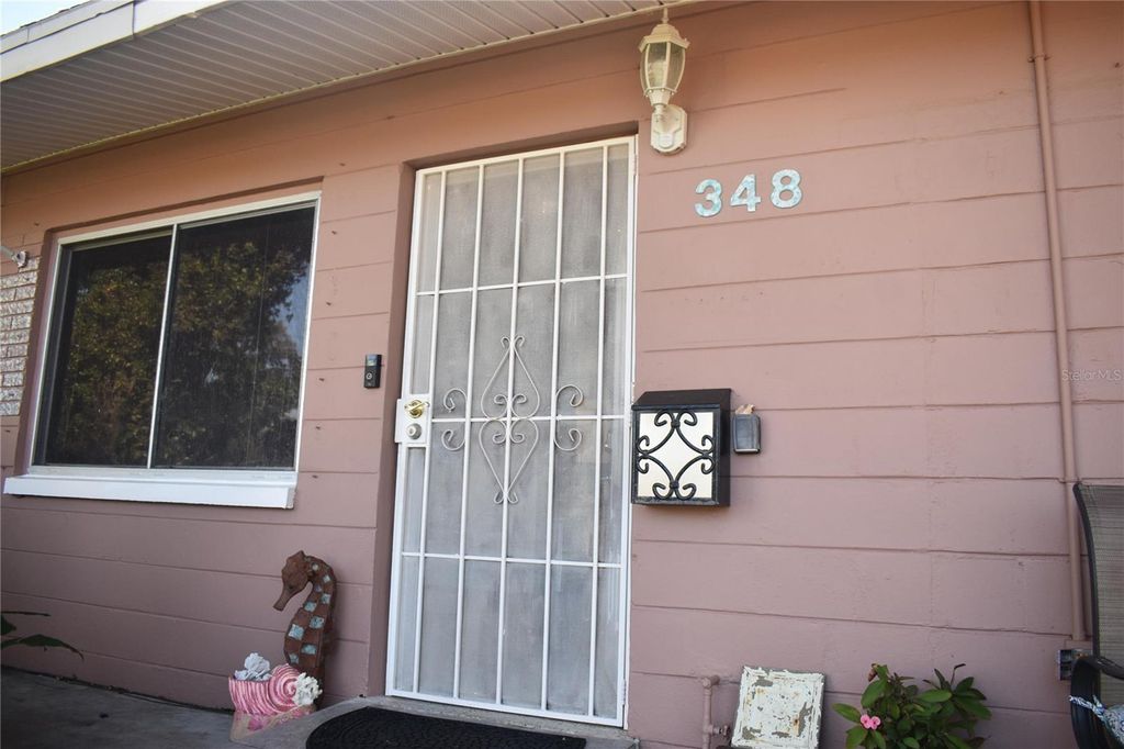 Photo of 348 Lewis Boulevard SE, St Petersburg, FL 33705 (MLS # O6378347)