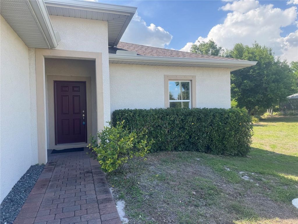 Photo of 108 Boxwood Lane, Rotonda West, FL 33947 (MLS # D6147180)