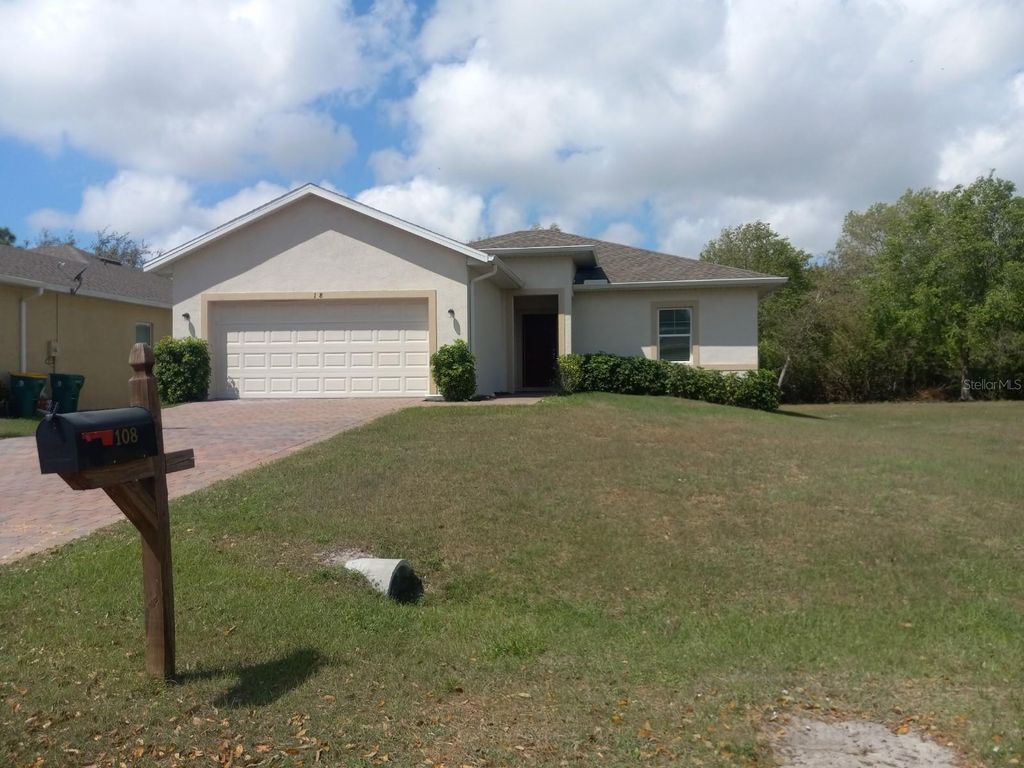 Photo of 108 Boxwood Lane, Rotonda West, FL 33947 (MLS # D6147180)