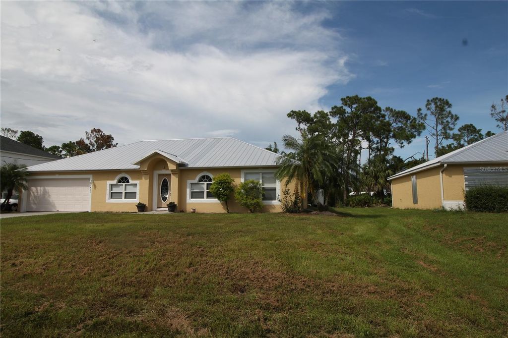 Photo of 5492 Douglas Road, North Port, FL 34288 (MLS # C7518627)