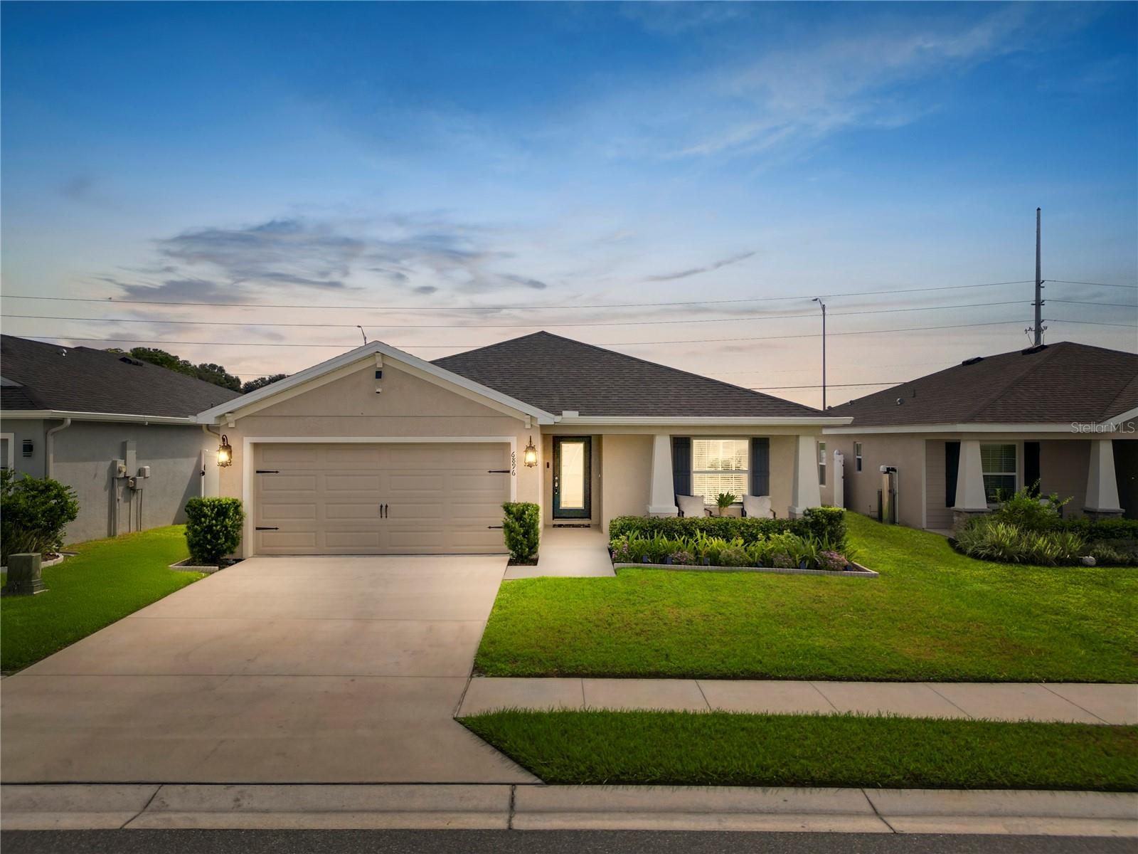 HOME COMES WITH PAID OFF SOLAR PANELS WITH FULL PRICE OFFER!!!!
Welcome to your next Home Sweet Home nestled in the highly desirable Willow Ridge Community in North Lakeland, Florida. This inviting property, ideally located in a serene neighborhood, offers a perfect blend of comfort, style, and practical living. Step into this beautifully crafted house that spans over 1715 sq ft of thoughtfully designed living space. Here, every room tells a story of quality and attention to detail. This gorgeous home includes four spacious bedrooms and two well-appointed bathrooms, providing ample space for family, guests, and home offices alike. This 2022 built home has everything a family needs. It also has a beautifully designed kitchen and breakfast bar, with its practical layout and appliances, invites both the novice and the experienced cook to revel in culinary exploration. The dining area, seamlessly connected, promises shared meals and conversations in a cozy setting. This open split floor plan has plenty of room for all to gather for special occasions and holidays. Just imagine sitting on the beautifully tiled back patio sipping your favorite drink and reading a good book. Beyond the home’s appeal, the neighborhood surrounding Willow Ridge is equally impressive. You'll find yourself in a community known for its friendly atmosphere and convenient access to local amenities. From parks and recreational spaces to shopping and dining options, everything you need is just a short drive away. While this house offers no specific community features, its location and the quality of construction provide a canvas to create a lifestyle as dynamic and filled with activities as you desire. This property is not just a house; it's a place to call home, where every inch is built with care, and every moment brings the promise of new memories!
