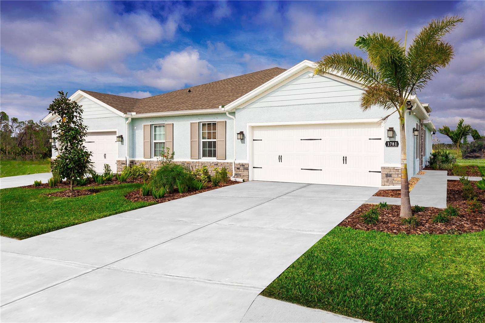 Under Construction. Welcome home to Park Ridge Villas, a new CDD-free community in Spring Hill where you can enjoy the Florida lifestyle to the fullest. Just minutes from our community, you'll find world-class golf courses, award-winning beaches, and a variety of restaurants, shops, and attractions. Hernando Beach is less than 15 minutes from your new home. When you want to enjoy the outdoors, the Suncoast Trail is right outside your front door, perfect for a walk or bike ride. Enjoy two private Pickleball courts, open green space, and a walking trail, with low monthly fees. The Winterhaven floor plan gives you all the style and comfort you could want all on one level. Your convenient two-car garage opens to the laundry room. Step into the inviting foyer, which leads to either a spacious bedroom or into the wide-open dining area and adjoining gourmet kitchen. A large center island overlooks the welcoming great room and lanai. An additional bedroom and full bath offers family and guests a comfortable place to stay. Your luxurious owner’s suite includes a sprawling walk-in closet and a dual vanity master bath. You'll simply love the Winterhaven. All Ryan Homes now include WIFI-enabled garage opener and Ecobee thermostat. **Closing cost assistance is available with use of Builder’s affiliated lender**. DISCLAIMER: Prices, financing, promotion, and offers subject to change without notice. Offer valid on new sales only. See Community Sales and Marketing Representative for details. Promotions cannot be combined with any other offer. All uploaded photos are stock photos of this floor plan. Actual home may differ from photos.