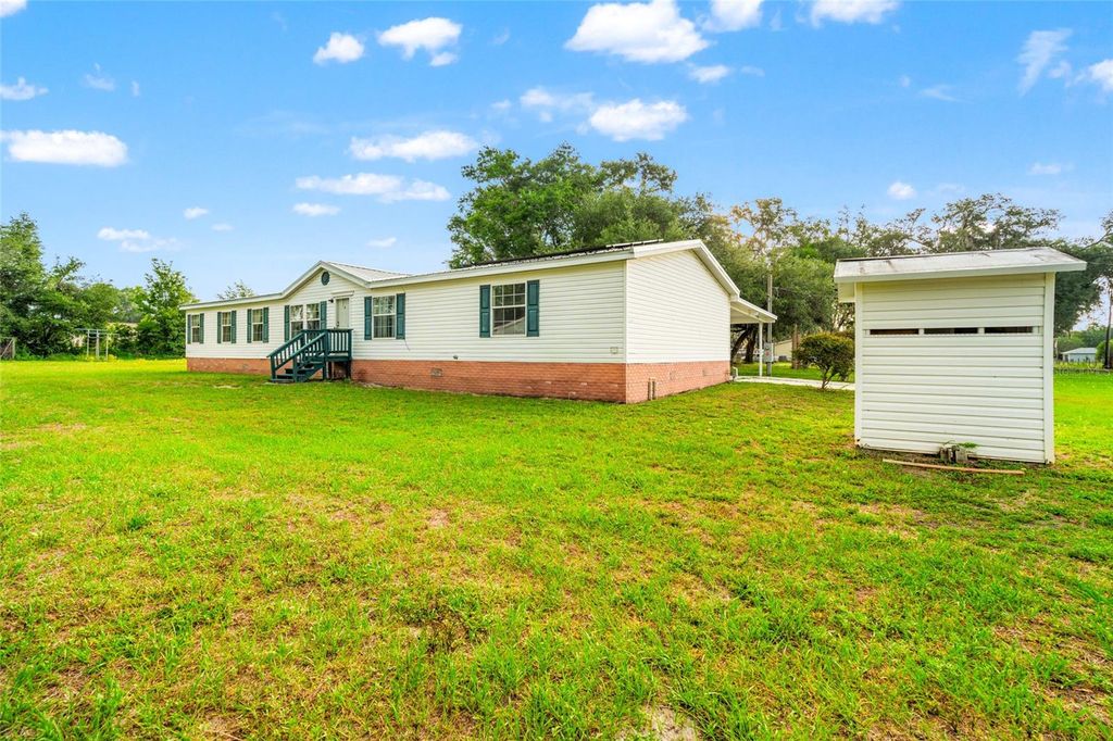 Photo of 27549 Fisher Lane, Dade City, FL 33525 (MLS # TB8391066)