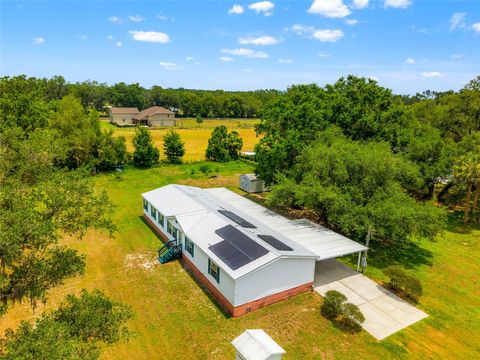 Photo of 27549 Fisher Lane, Dade City, FL 33525 (MLS # TB8391066)