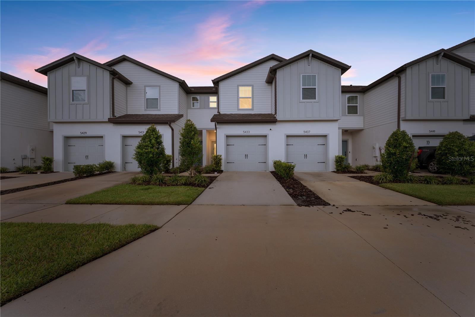 Live Bright, Live Beautifully in this stunning 2 bed, 2.5 bath Wesley Reserve townhome located in Chapel Crossings! Step inside to an inviting OPEN FLOOR PLAN where the kitchen steals the show with WHITE SHAKER CABINETS topped with crown molding, granite countertops, stainless steel appliances, pendant lights, and LED lighting. The living and dining areas flow seamlessly to the outdoors through three-panel 8-foot sliders, filling the space with natural light and offering views of the serene conservation area with a walking trail. A convenient powder bath is also located downstairs. Upstairs, retreat to the oversized owner’s suite, complete with a ceiling fan, wall-to-wall closet, and a spa-like primary bath featuring dual vanity sinks and an oversized linen closet. The secondary bedroom is equally spacious and offers plenty of comfort, while carpeted floors upstairs add warmth and coziness throughout. Chapel Crossings is a vibrant Wesley Chapel community that offers resort-style amenities, including a lazy river, beach-entry pool, fitness center, dog park, and clubhouse. Conveniently located off SR-54 and I-75, you’ll enjoy quick access to downtown Tampa, Gulf Coast beaches, The Grove, Wiregrass Mall, and top hospitals, schools, and retail. This townhome combines modern design with a serene setting—ready for you to move in and make it your own!