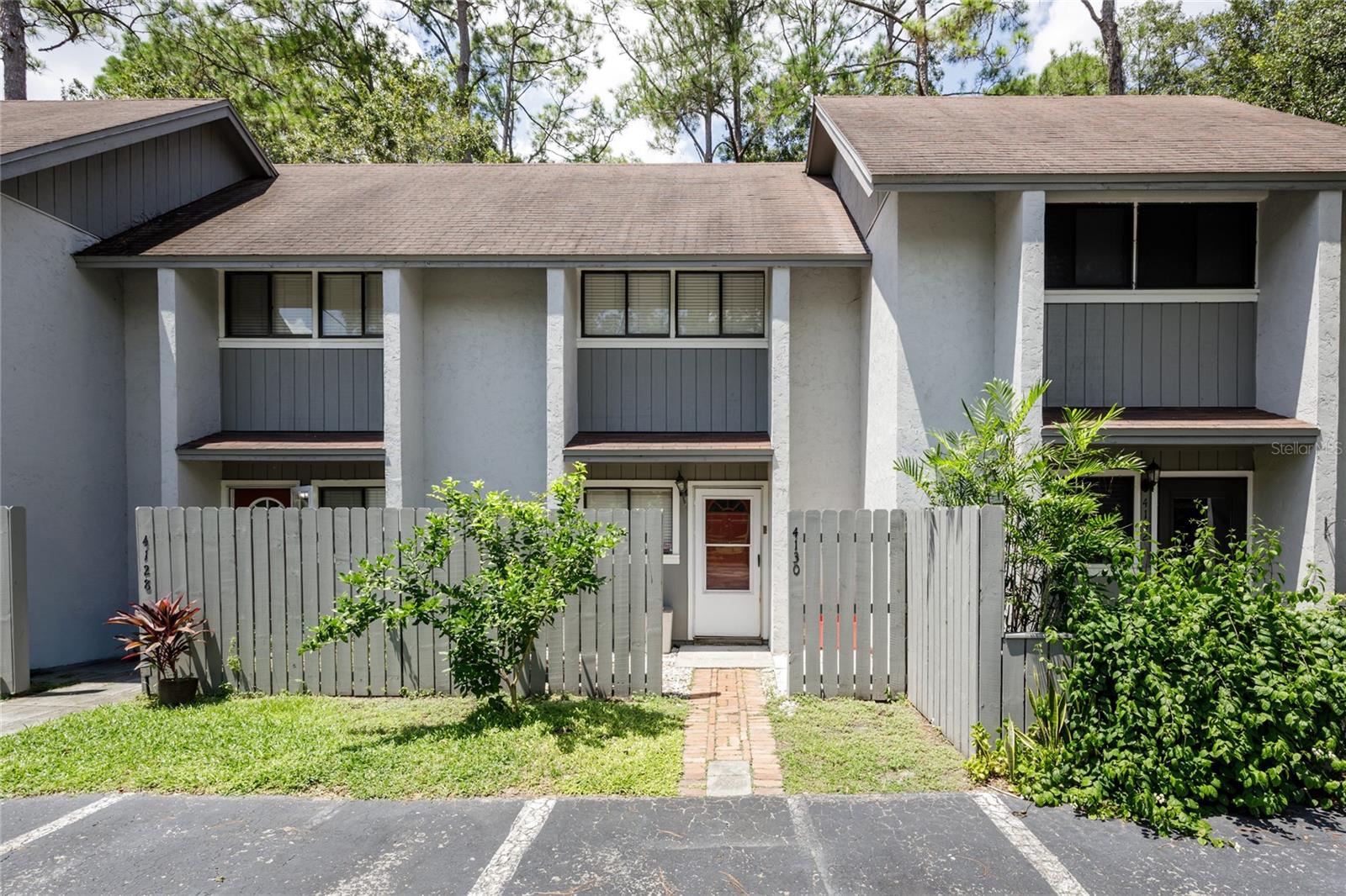 Conveniently located in the heart of NW Gainesville, this affordable condo is move-in ready and waiting for its new owner. Whether you're searching for a comfortable home or a smart investment, this property offers the best of both worlds. Bellamy Forge provides a quiet, friendly atmosphere while still being close to everything. Enjoy a peaceful neighborhood just 15 minutes from the University of Florida, with popular restaurants, a public library, and Publix all within walking distance. Santa Fe College and I-75 are also just a short 10-minute drive away. Recent updates include new carpet, fresh interior paint, and a brand new refrigerator. All kitchen appliances are stainless steel. All living spaces and the second bedroom have laminate flooring. When the weather cools, relax or entertain on the huge screened-in patio, perfect for Florida living. Community amenities include 2 swimming pools, tennis courts, clubhouse, and playground. Enjoy worry-free living as your HOA covers all exterior maintenance and landscaping. Don’t miss this opportunity to own a low-maintenance home in a prime location.
