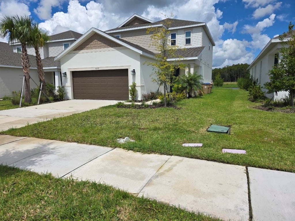 Photo of 5659 Ficus Aurea Street, Kissimmee, FL 34758 (MLS # S5158791)