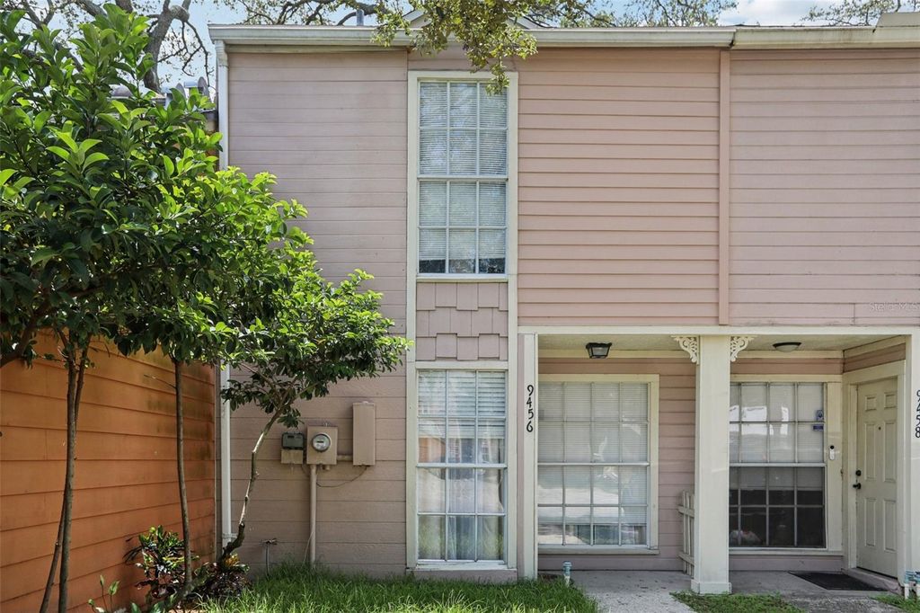 Photo of 9456 Forest Hills Circle, Tampa, FL 33612 (MLS # TB8412329)