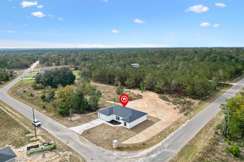Photo of 2 Fisher Lane Trail, Ocklawaha, FL 32179 (MLS # G5105056)