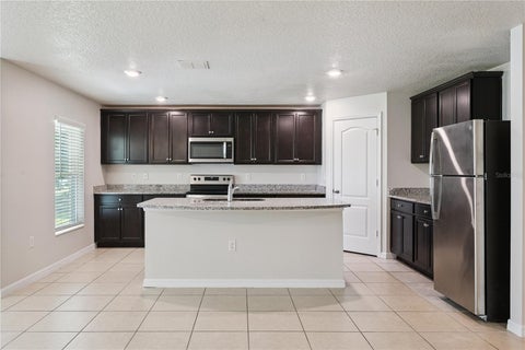 Tiny photo for 1694 Hideaway Flat Street, Mascotte, FL 34753 (MLS # O6445589)