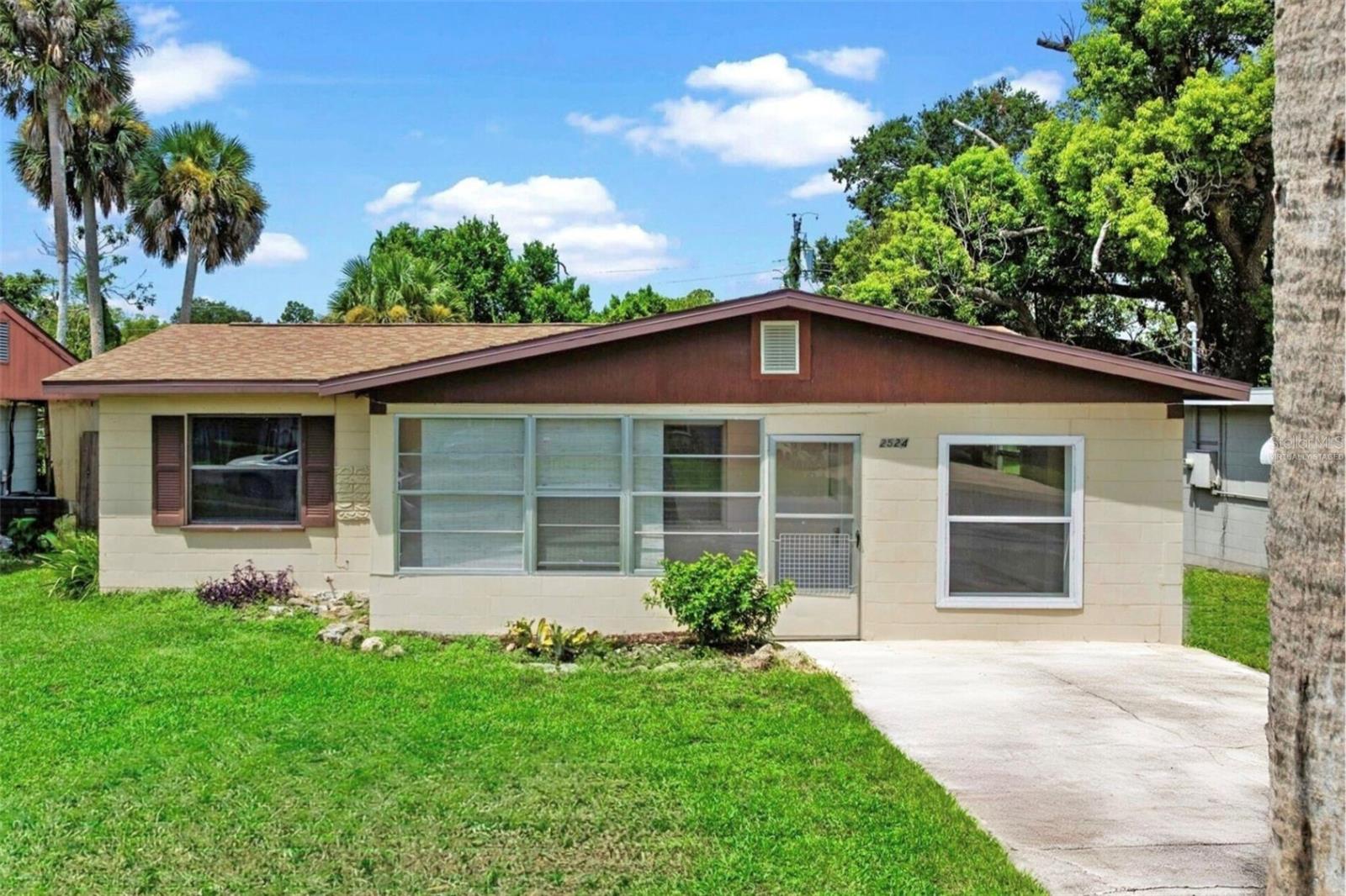 One or more photo(s) has been virtually staged. Welcome to this beautifully remodeled 3 bedroom, 2 bath home, perfectly located in the heart of South Daytona. Light and bright throughout, this move-in ready property has been thoughtfully updated with modern finishes and timeless charm. The kitchen has been fully remodeled and features stone countertops, plenty of cabinet space, and stylish finishes. Both bathrooms have been beautifully renovated, the interior has been freshly painted, and the roof was replaced in 2021. Enjoy outdoor living on the screened-in back porch or relax on the welcoming front porch. The backyard offers mature landscaping that provides natural privacy, creating a comfortable space to unwind or entertain. This home is ideally situated just minutes from the Halifax River, where you can enjoy boating, fishing, and beautiful waterfront parks. With quick access to I-95 and I-4, you’re also close to Embry-Riddle Aeronautical University, Daytona International Speedway, One Daytona, Tanger Outlets, Daytona International Airport, and of course, the iconic “World’s Most Famous Beach.” Whether you’re looking for a primary residence, vacation getaway, or stylish retreat, this home is ready for its next owner. Don’t miss your chance to own this beautifully updated home in one of the most convenient locations in South Daytona—schedule your private showing today!