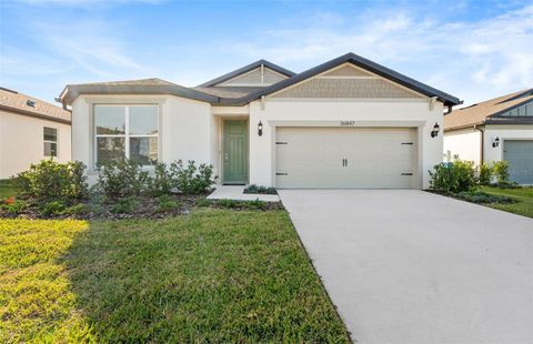 Photo of 36847 Rio Grande Drive, Zephyrhills, FL 33540 (MLS # TB8416620)