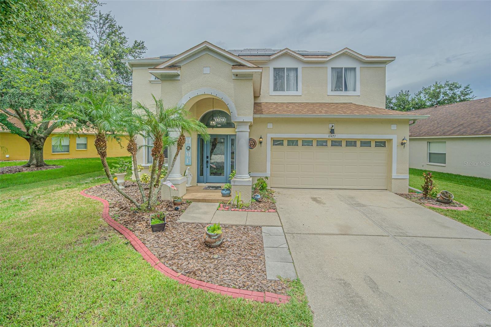 ASSUMABLE loan 3.75% WITH APPROVAL! What a GREAT rate for this Beautifully Maintained 2 story home ON THE POND in the Gated Community of Heritage Isles! Nestled on an Oversized lot on a quiet Cul de sac street this Light, Bright, open home offers a spacious and functional layout and welcomes you with New Saint Augustine SOD lawn, new Smart sprinkler system with 6 zones and Concrete curbing to set off the Landscaping. Enter this GRAND home with Arched entry onto GLEAMING floors in the Foyer and Formal Living and Dining rooms for Easy Entertaining. Spacious Kitchen features Wood cabinets, Granite counters and stone backsplash with eat in dinette area OPEN to family room for comfortable living! Sliding doors to Covered screened back lanai provides the perfect place to relax or BBQ, overlooking fenced backyard with Serene Pond views beyond! Downstairs inside laundry room features window, utility sink and loads of storage. Stained wood treads set off the white staircase to the upstairs loft which leads to 4 bedrooms and 3 full baths. Secondary bedrooms are spacious with ample closets and are on the opposite side of the Owners retreat which is Oversized with a FLEX SPACE area that could be used as a fitness/exercise area, home office, sewing, craft room or den! Bath ensuite boasts LARGE closet with window, dual sinks, soaking tub plus separate shower. Other features to mention are the 2019 Water Heater, 2019 American Standard 5 ton AC, upgraded lighting, ceiling fans, mirrors, tamper proof electric outlets, oil rubbed bronze levers and hinges throughout home, storage racks in the garage and FENCED BACKYARD with Fire Pit overlooking the POND! Superb location in New Tampa with easy access to all shopping, restaurants, medical facilities and major highways for easy commute to Tampa, Orlando, Wesley Chapel, Ocala, Airports and the Beaches! Don’t miss your chance to own this exceptional home with an assumable low-rate mortgage... CALL TODAY!