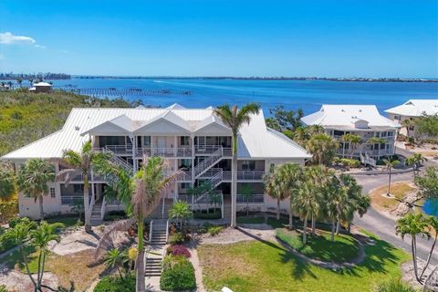 Photo of 11000 Placida Road #302, Placida, FL 33946 (MLS # D6144413) Photo of 11000 Placida Road #302, Placida, FL 33946 (MLS # D6144413)