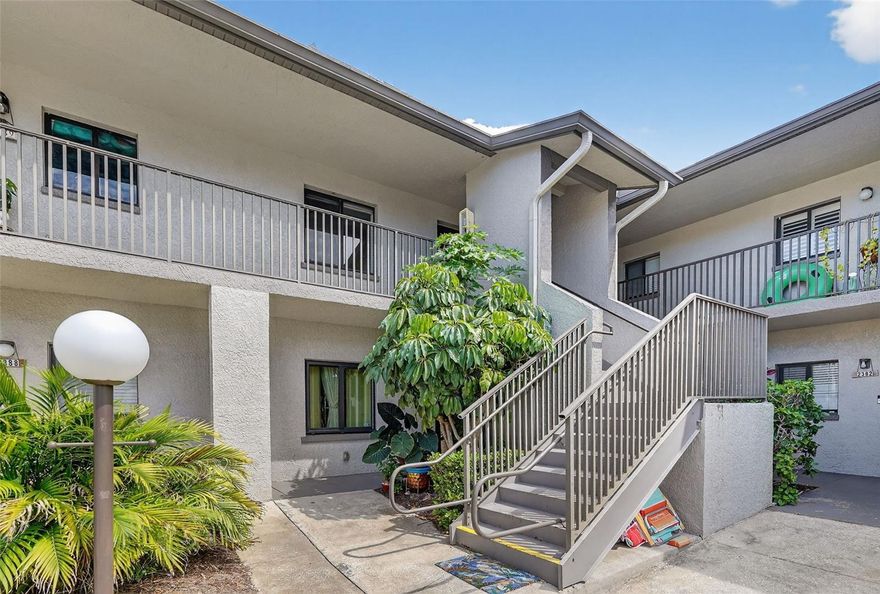 Welcome to this charming two-bedroom, two-bathroom condo in the heart of Dunedin. Located on the second floor with easy access to the stairs, this home offers comfort, convenience, and a lifestyle close to everything the area has to offer. This unit offers plenty of potential and just needs a little updating to make it your own. Step inside through the foyer, where the kitchen is immediately to your right, complete with matching appliances. The open-concept living and dining room combo features vaulted ceilings, wood floors, and sliding glass doors that lead to a private, screened-in porch - perfect for enjoying the Florida breeze. The primary bedroom features wood flooring and a ceiling fan, and it offers a private bathroom with a shower/tub combination. Additional bedroom is nicely sized and has a ceiling fan. For added convenience, the unit includes an in-unit washer and dryer and an assigned parking spot. The community provides access to a boat ramp leading to the river and a refreshing pool, making it easy to enjoy Florida’s outdoor lifestyle. All of this just minutes from downtown Dunedin, with its vibrant dining, shops, parks, and golfing. The Dunedin Causeway and Gulf beaches are only about 10 minutes away, giving you the best of both worlds - tranquil condo living and easy access to everything you need.