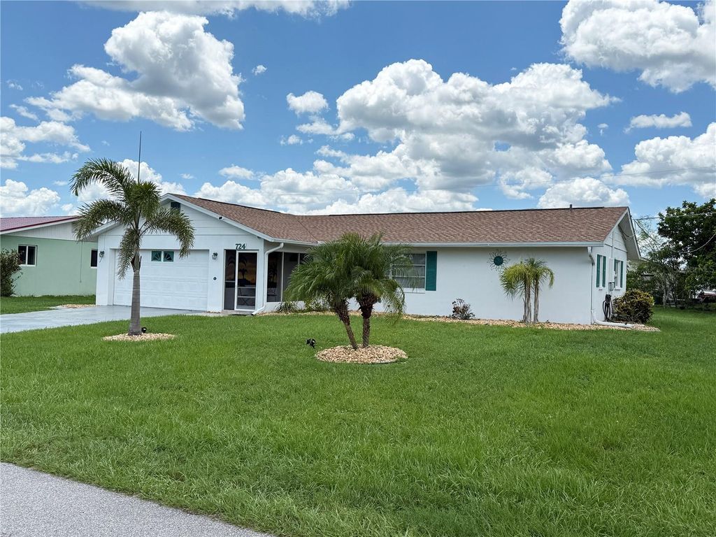 Photo of 724 Hartford Drive NW, Port Charlotte, FL 33952 (MLS # C7511504)