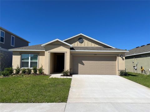 Photo of 13031 Thatch Palm Way, Orlando, FL 32828 (MLS # O6387948)