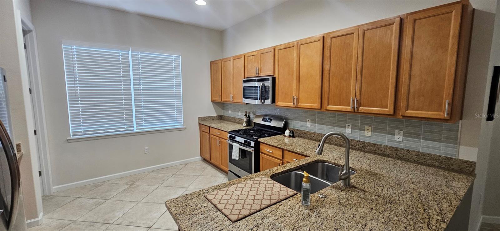 1677 VICTORIA GARDENS DRIVE