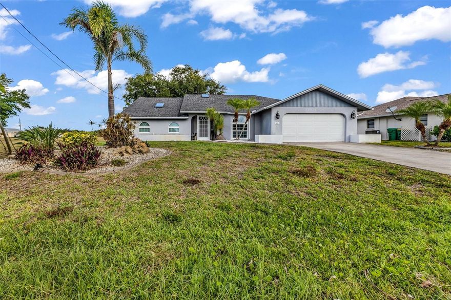 Located in the highly desirable community of Rotonda West, this beautifully maintained FURNISHED 3-bedroom, 2-bath home with a 2-car garage offers 2,045 square feet under air and picturesque canal views-perfect as a primary residence, seasonal retreat or investment property. Designed for comfortable Florida living, this home features porcelain and ceramic tile flooring throughout along with a spacious, functional layout. The formal living room showcases French doors leading to the lanai and flows seamlessly into the dining room, creating an ideal setting for entertaining guests. The inviting family room is highlighted by a stunning wood plank ceiling and skylights that fill the space with natural light. The kitchen is equipped with stainless steel appliances, granite countertops, tile backsplash, breakfast bar and a cabinet pantry. The spacious primary suite offers a walk-in closet and French doors providing direct access to the lanai. The ensuite bathroom features dual sinks, a relaxing garden tub, a tiled steam walk-in shower, and a linen closet. Both guest bedrooms also include walk-in closets, offering ample storage and comfort for family or visitors. The guest bathroom includes a single vanity and walk-in shower. Enjoy exceptional outdoor living on the expansive 28x33 extended paver lanai, complete with an outdoor kitchen and jacuzzi overlooking the water. Beyond the lanai, a separate paver sitting area with a firepit creates the perfect setting for relaxing evenings outdoors. The private 12x8 dock is ideal for fishing or enjoying breathtaking sunset views. Washer and dryer are conveniently located in the garage. Recent updates provide peace of mind: Hot Water Heater (2025), Impact Windows (2020), Boat Dock (2019), Roof & Impact Garage Door (2018), and AC (2017). Enjoy the peaceful setting and convenient location close to golf courses, beaches, dining, and shopping that make Rotonda West one of Southwest Florida’s most sought-after communities. Ask to see this one first...make YOUR appointment today!!!