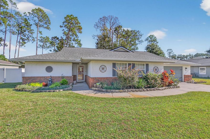 SO MUCH TO OFFER in this lovely Palm Coast home in Indian Trails! Large living room, dining room and kitchen spaces.
Extra large Florida room with view of extensive fenced backyard with multiple sheds, deck, gazebo, firepit and tiki bar. It's your own private oasis! New scratch resistent, waterproof LVP, roof and HVAC new in 2018, all newer appliances stay including washer and dryer. New primary bath with large walk-in shower. French doors to Florida room from the primary bedroom and living room. Exterior door from the laundry room to the backyard including an inside shower. Gutters installed in 2023, fence in 2022. Lawn sprinkler system with irrigation well. Like we said, SO MUCH TO OFFER!!